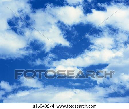 Picture - Blue sky and Clouds, Low angle view, Full frame. Fotosearch