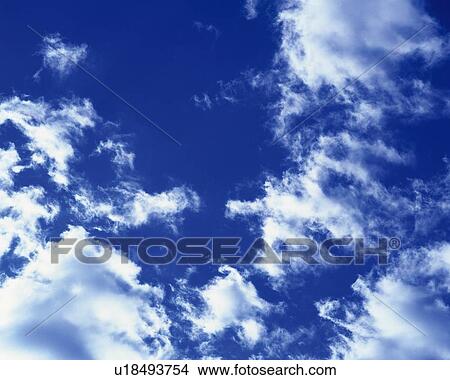 Blue sky and Clouds, Low angle view View Large Photo Image Picture - Blue sky and Clouds, Low angle view. Fotosearch