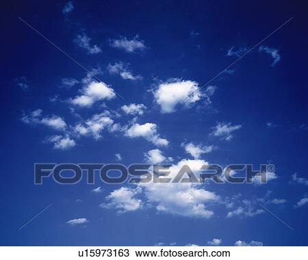 Blue sky and Clouds, Low angle view View Large Photo Image Stock Image - Blue sky and Clouds, Low angle view. Fotosearch