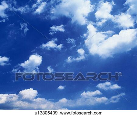 Blue sky and Clouds, Low angle view View Large Photo Image Stock Photo - Blue sky and Clouds, Low angle view. Fotosearch