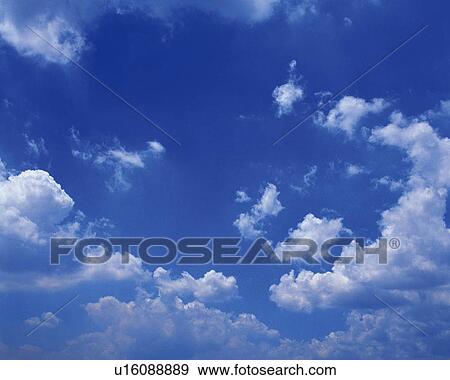 Stock Photo - Blue sky and Clouds, Low angle view. Fotosearch
