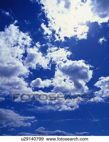 Blue sky and Clouds, Low angle view View Large Photo Image Stock Photo - Blue sky and Clouds, Low angle view. Fotosearch