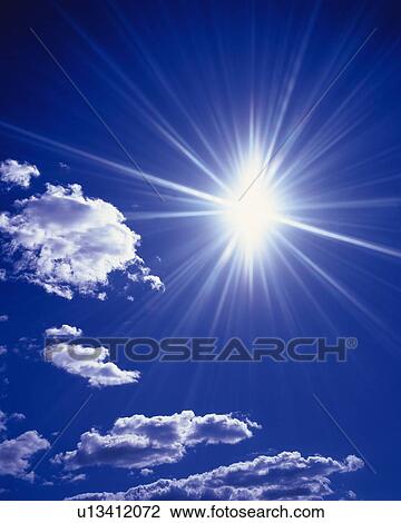 Blue sky and Clouds with Sun, Low angle view, Lens Flare View Large Photo Image Stock Image - Blue sky and Clouds with Sun, Low angle view, Lens Flare. Fotosearch