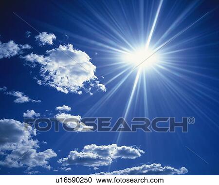 Blue sky and Clouds with Sun, Low angle view, Lens Flare View Large Photo Image Stock Image - Blue sky and Clouds with Sun, Low angle view, Lens Flare. Fotosearch