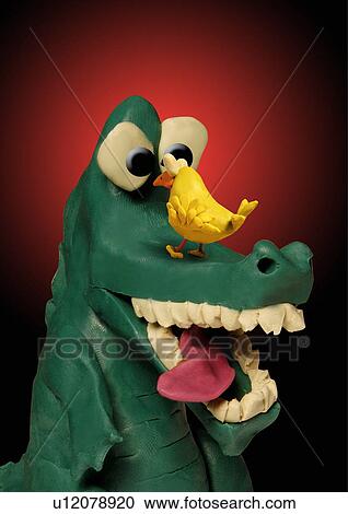 Alligator with bird on his snout View Large Illustration Clipart - Alligator with bird on his snout. Fotosearch