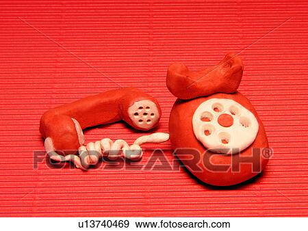 Stock Illustration - An old fashioned telephone with handset off the hook. Fotosearch