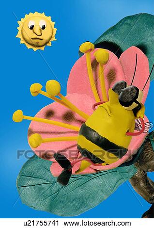 Clip Art - Bee sunbathing on a flower. Fotosearch