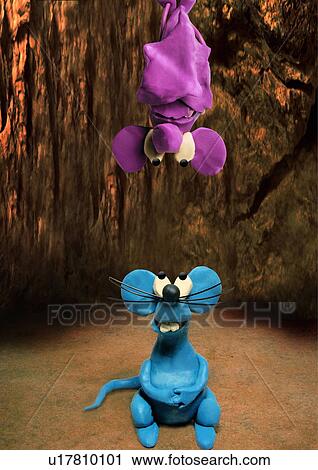 Clip Art - Mouse looking up at bat hanging upside down. Fotosearch