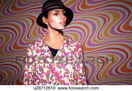 Stock Illustration - Woman in a patterned shirt and a hat. Fotosearch