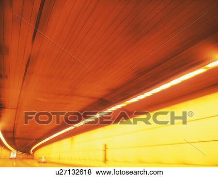 View of an illuminated tunnel View Large Illustration Stock Illustration - View of an illuminated tunnel. Fotosearch