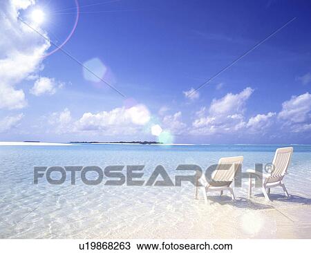 Drawing - View of chairs on beach. Fotosearch