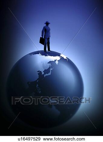 Stock Illustration - View of a man standing on a globe. Fotosearch