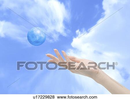 Stock Illustration - Close-up of a hand and a ball. Fotosearch