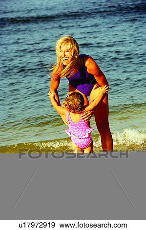 Laughing, Females, Mothers, Kid, Moms, Female, Baby View Large Photo Image Stock Photo - Laughing, Females, Mothers, Kid, Moms, Female, Baby. Fotosearch