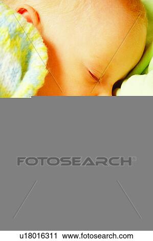 Stock Image - Woman, Mothers, Female, Happy Childhood, Humans, Nursing, Baby. Fotosearch