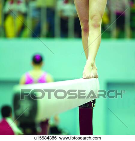 Stock Photograph - Gym, Indoor Sports, Athletic, Healthy, Gymnast, Health, Games. Fotosearch