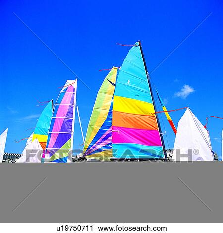 Stock Image - Sports, Players, Gymnast, Outdoor Sports, Athletic, Sailship, Beach. Fotosearch