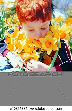 Stock Photography - Flower, Child, Plant, Kids, Happy, Boys, Kid. Fotosearch