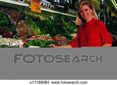 Picture - Market, Supermarkets, Carrots, Markets, Woman, Females, Supermarket. Fotosearch