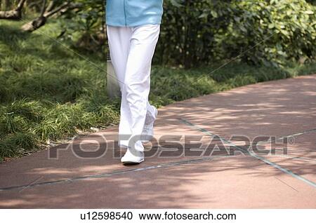 Woman jogging, low section View Large Photo Image Stock Image - Woman jogging, low section. Fotosearch