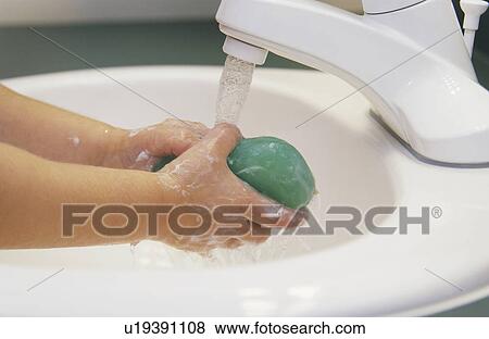 Child washing hands View Large Photo Image Stock Photo - Child washing hands. Fotosearch