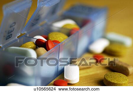 Pill organizer with pills View Large Photo Image Picture - Pill organizer with pills. Fotosearch