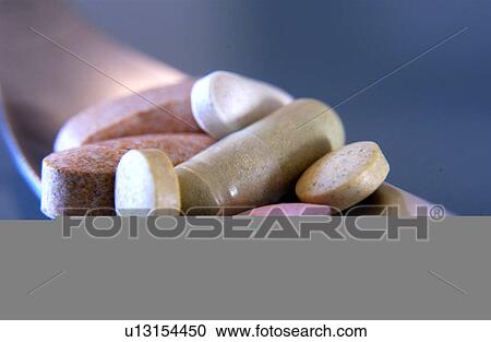 Pills on fork View Large Photo Image Stock Image - Pills on fork. Fotosearch