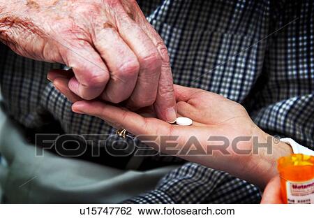 Senior man taking pills View Large Photo Image Stock Image - Senior man taking pills. Fotosearch
