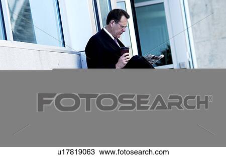 Businessman taking a break View Large Photo Image Stock Image - Businessman taking a break . Fotosearch