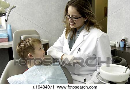 Boy getting dental exam View Large Photo Image Stock Image - Boy getting dental exam. Fotosearch