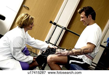 Man having physical therapy View Large Photo Image Stock Photo - Man having physical therapy. Fotosearch