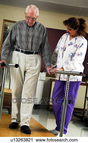 Man in physical rehabilitation View Large Photo Image Stock Image - Man in physical rehabilitation. Fotosearch