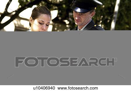 Army personnel discussing file View Large Photo Image Stock Image - Army personnel discussing file. Fotosearch