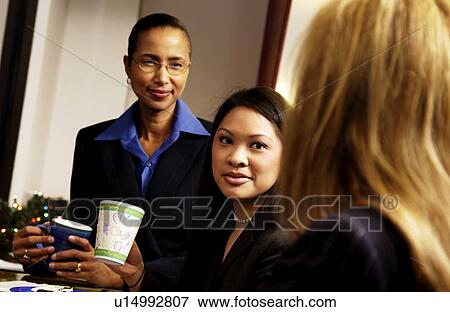 Stock Photo - Business meeting. Fotosearch