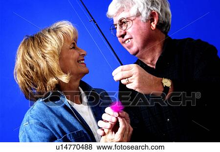 Couple fishing View Large Photo Image Stock Photo - Couple fishing. Fotosearch