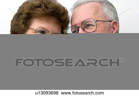 Stock Photo - Senior couple on phone. Fotosearch