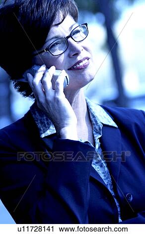 Businesswoman on cell phone View Large Photo Image Stock Image - Businesswoman on cell phone. Fotosearch