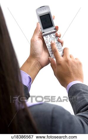 Businesswoman with cell phone View Large Photo Image Stock Photo - Businesswoman with cell phone. Fotosearch