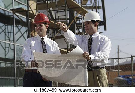 Stock Photo - Construction managers on site. Fotosearch