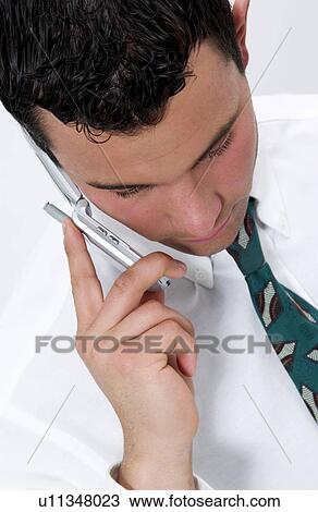 Businessman on cell phone View Large Photo Image Stock Image - Businessman on cell phone. Fotosearch