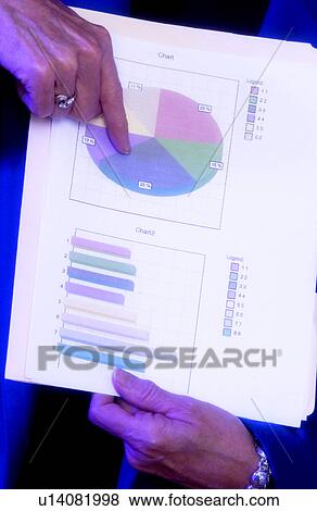 Businesswoman displaying pie chart View Large Photo Image Stock Photo - Businesswoman displaying pie chart. Fotosearch