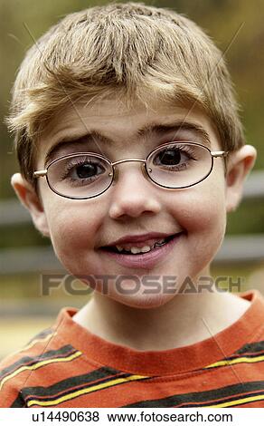 Boy with eyeglasses View Large Photo Image Stock Photo - Boy with eyeglasses. Fotosearch