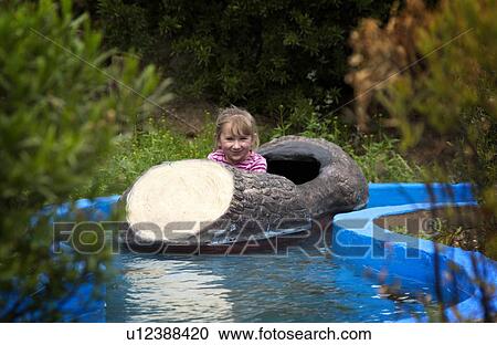 Girl on log flume ride View Large Photo Image Stock Image - Girl on log flume ride. Fotosearch