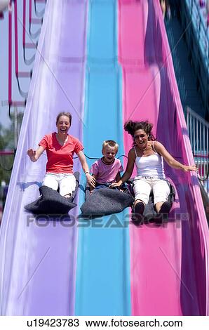 People on carnival ride View Large Photo Image Stock Image - People on carnival ride. Fotosearch