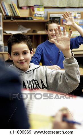 Stock Photo - School kids in class. Fotosearch