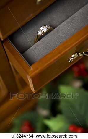 Picture - Diamond ring in jewelry box. Fotosearch