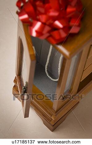 Pearl necklace in jewelry box View Large Photo Image Stock Photo - Pearl necklace in jewelry box. Fotosearch