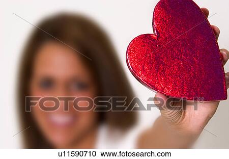 Woman holding heart box View Large Photo Image Stock Image - Woman holding heart box. Fotosearch