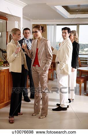 Bussiness people having a meeting View Large Photo Image Stock Photo - Bussiness people having a meeting. Fotosearch