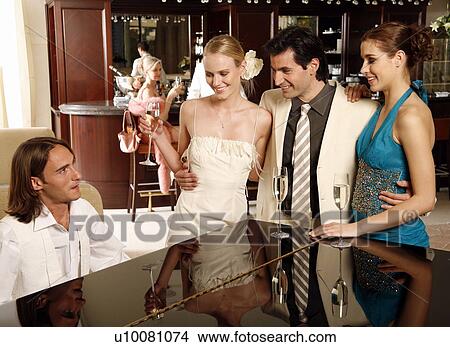 Group of people celebrating View Large Photo Image Picture - Group of people celebrating . Fotosearch